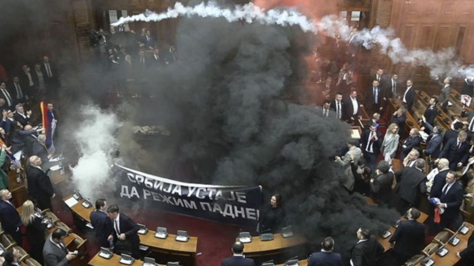 Chaos Erupts in Serbian Parliament as Opposition Uses Smoke Grenades